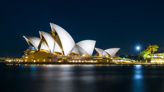 Sydney skyline at golden hour with the Opera House
