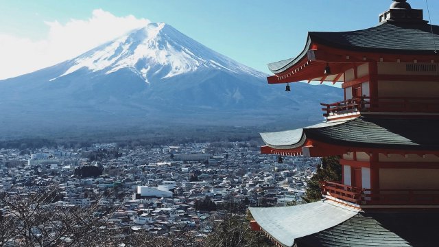 Mt. Fuji at golden hour reflected on still water